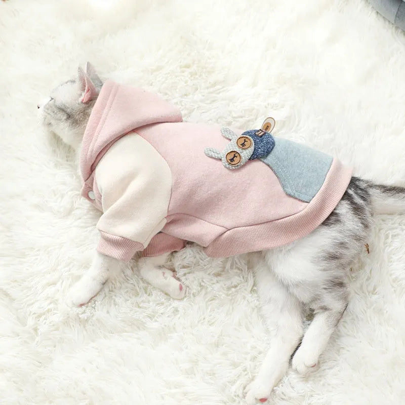 A brown cotton dog sweatshirt shown on a mannequin, with size tags for XS to 2XL.