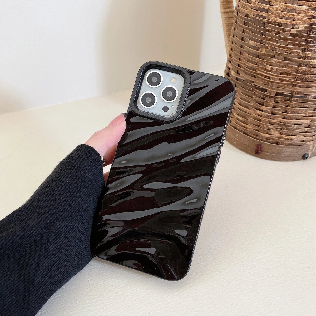 Soft solid colour wave pleated TPU protective case for Apple iPhone 17 series in burgundy on a white background.