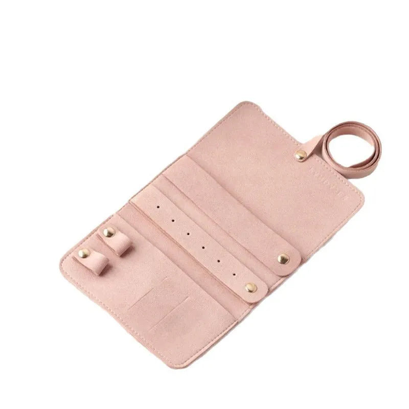 Soft brown leather and microfiber jewellery storage bag showing compact 12cm size.