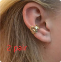 Women's starfish and conch shell stud earrings with electroplated gold finish