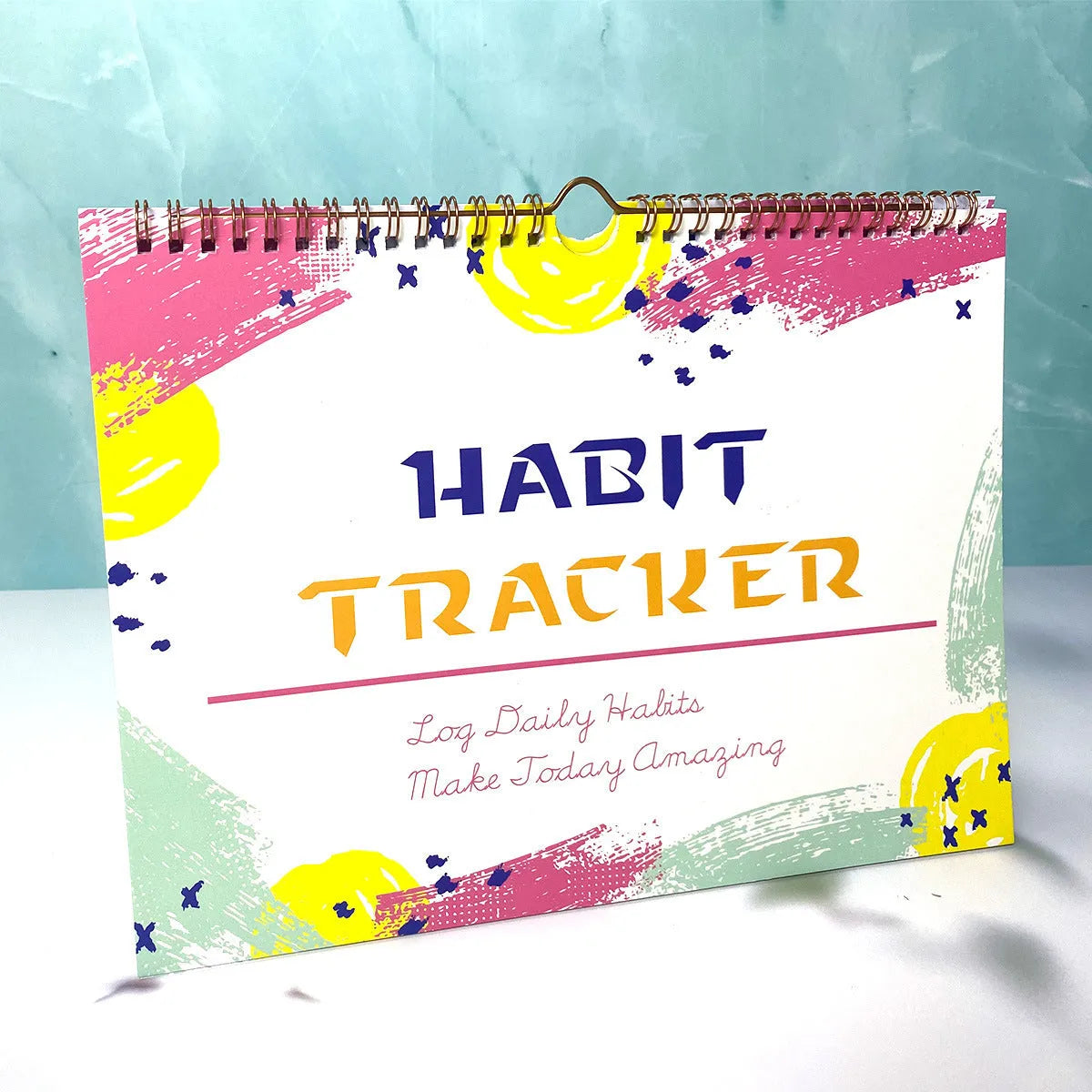 English habit tracking book with 12 pages measuring 21cm by 28cm in multiple colour options