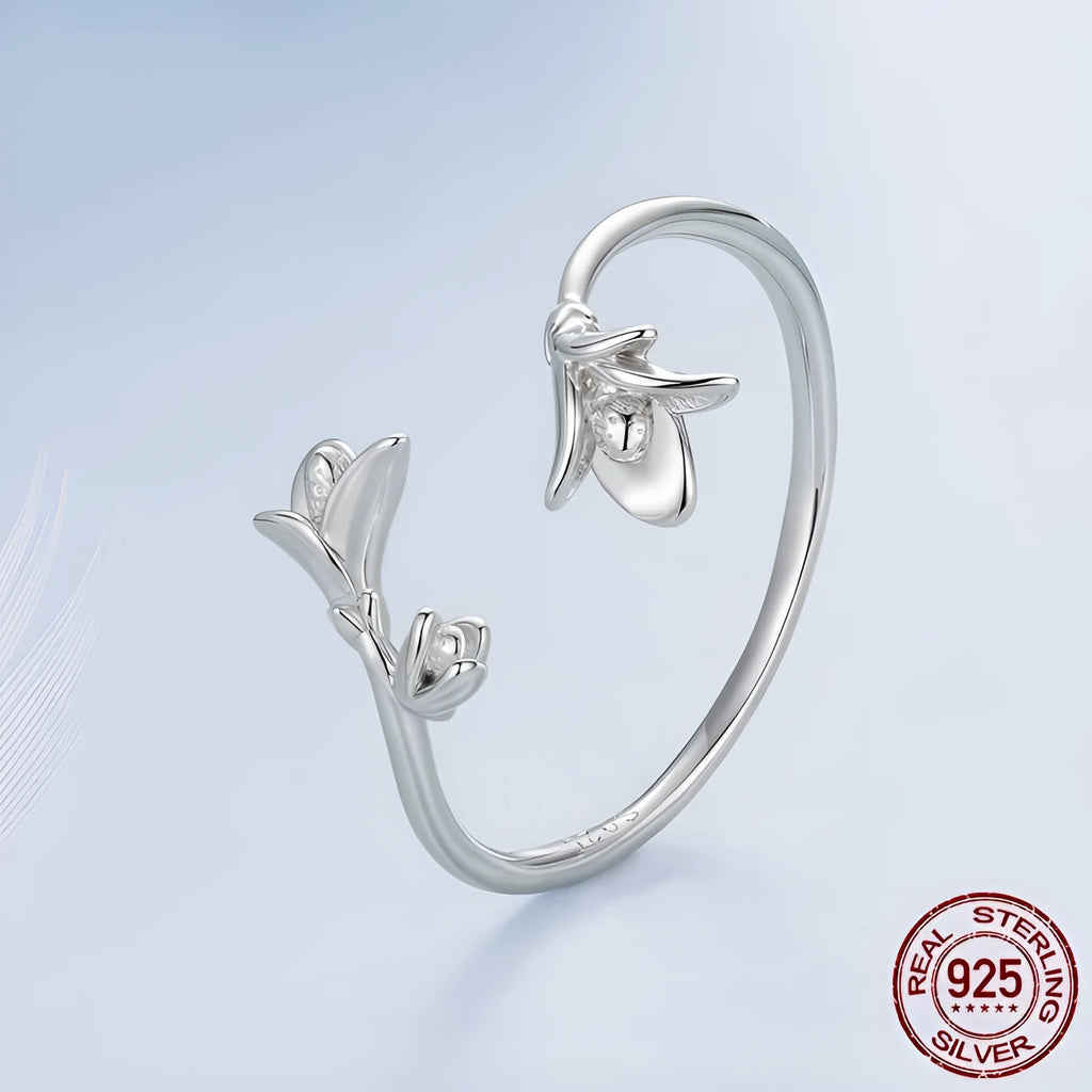 Women's S925 sterling silver lavender open ring with adjustable opening on a plain background