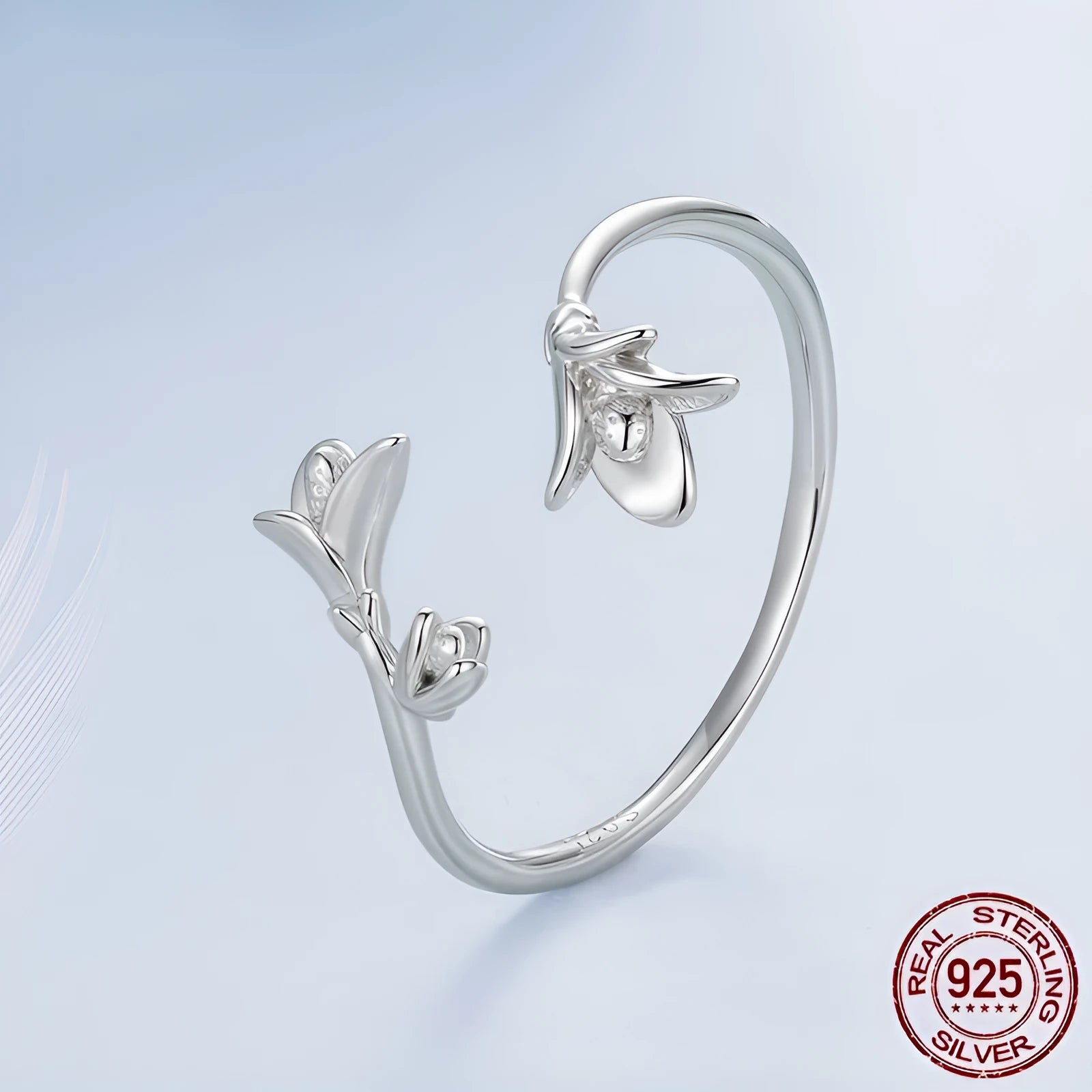 Women's S925 sterling silver lavender open ring with adjustable opening on a plain background