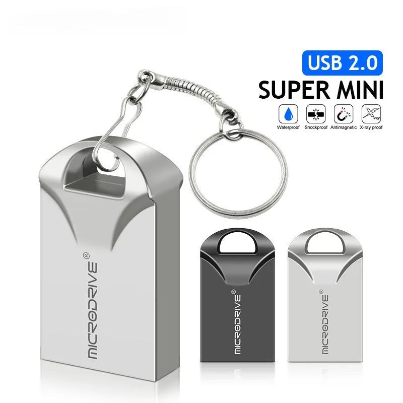Small black and silver metal USB flash drive showing miniature size
