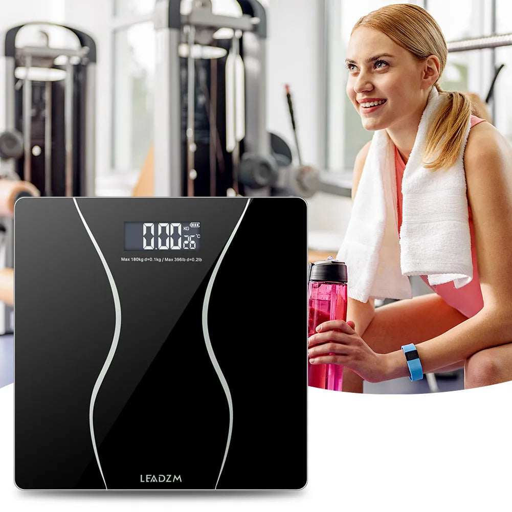 Black electronic household body scale with 180kg capacity for weight measurement