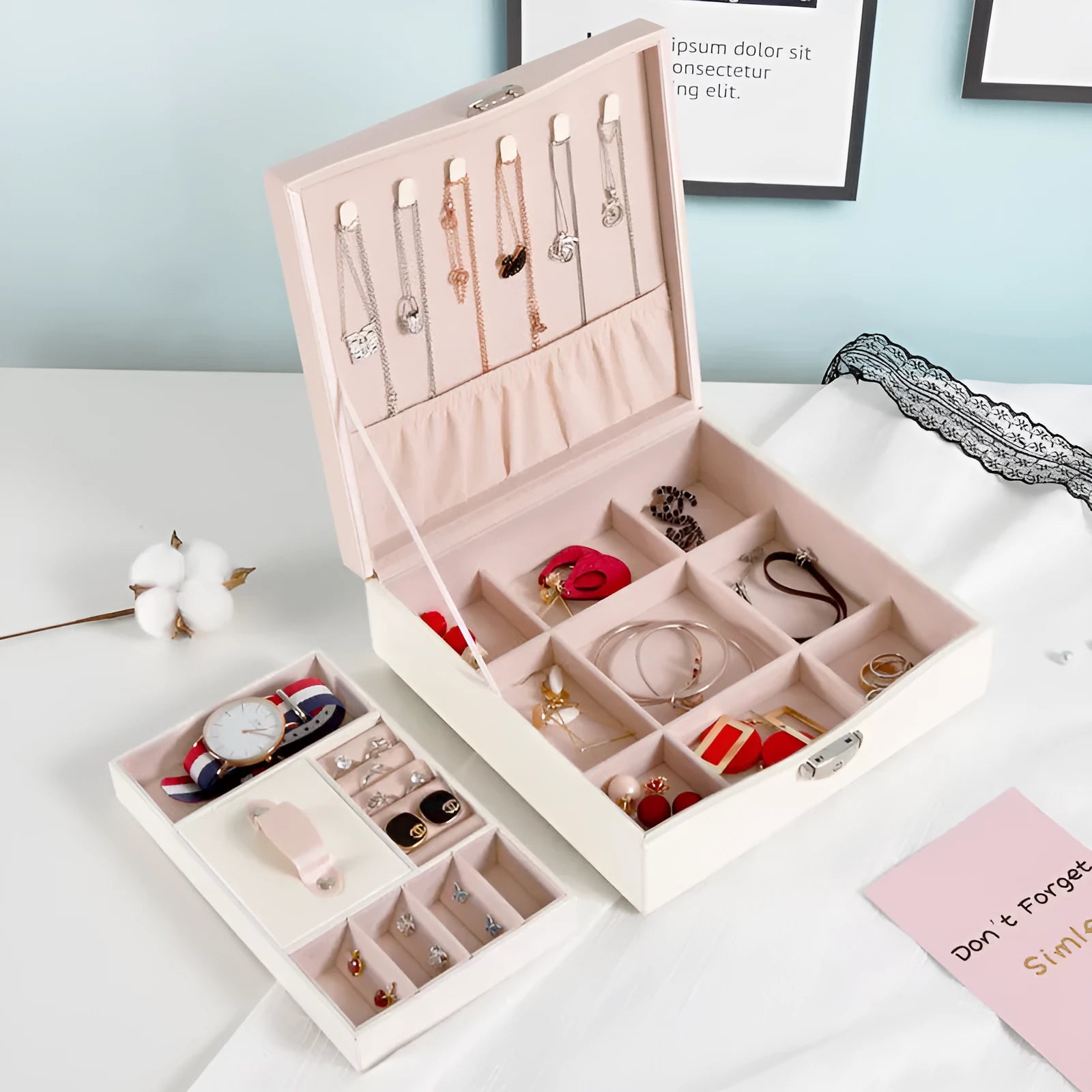 Red or white PU leather jewelry storage box with multiple compartments for necklaces and rings.