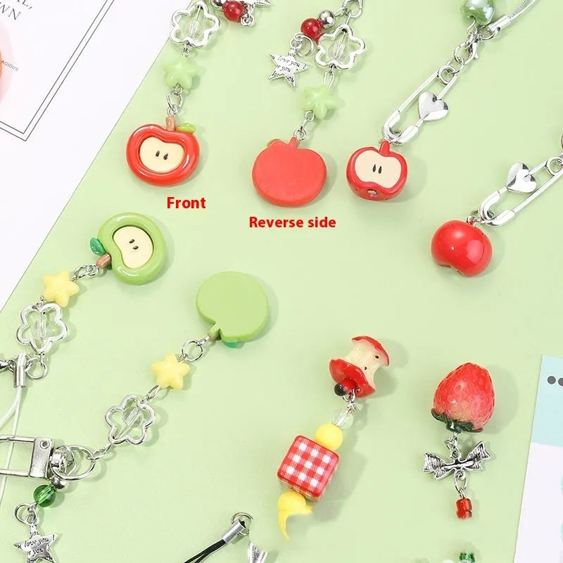 Fruit mobile phone charm keychain with apple, strawberry designs on plastic/resin with rope attachment