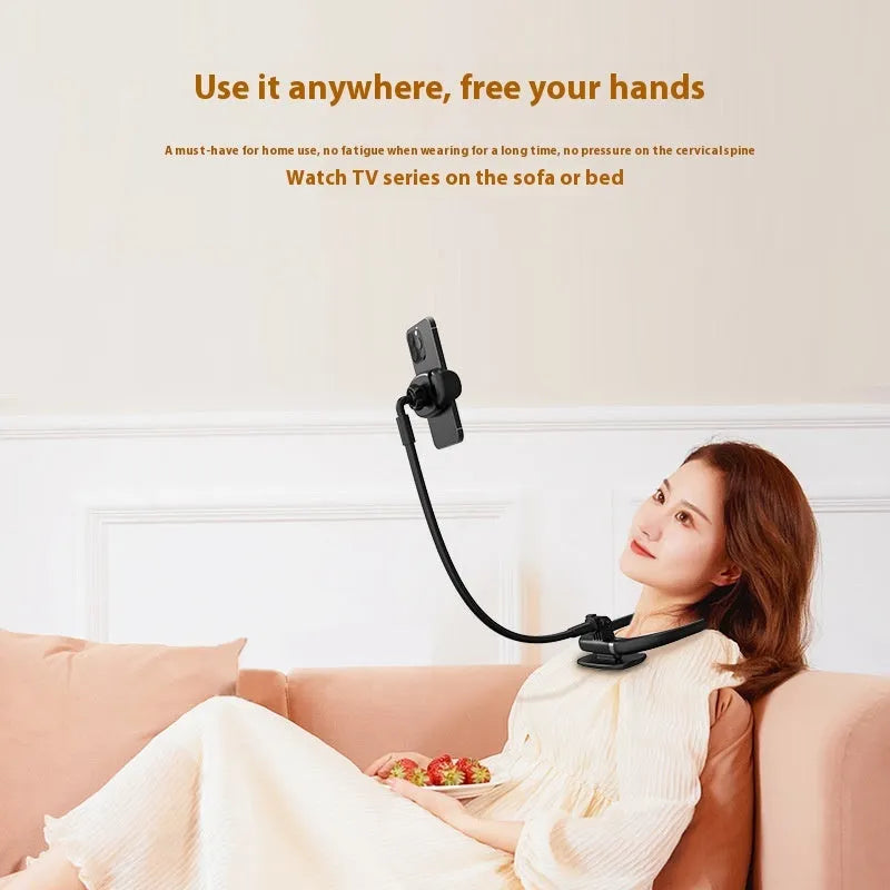 Black plastic hanging neck multifunctional desktop phone holder on desk with phone in place