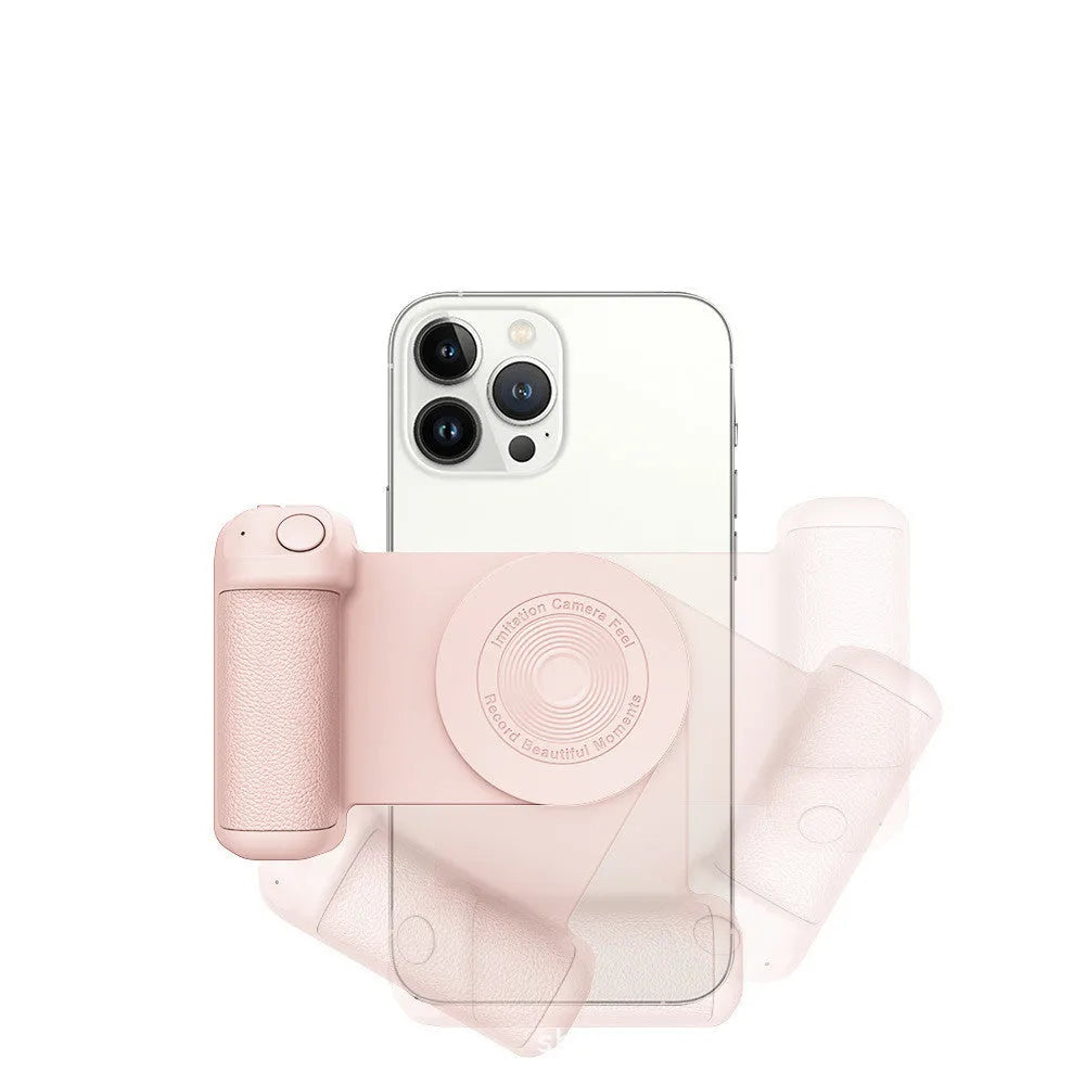 Black magnetic camera handle phone bracket with rotatable grip on wooden table