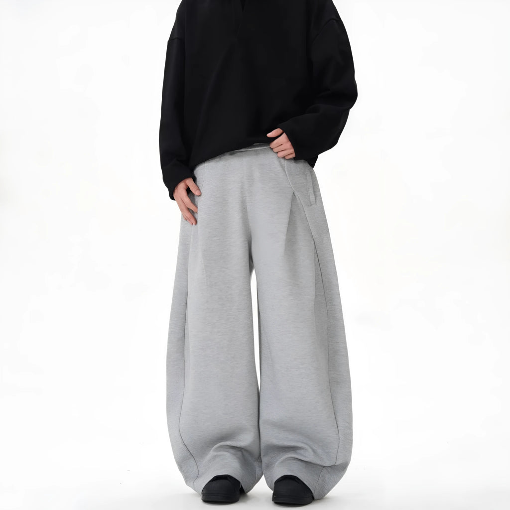 Women's wide-leg mid-waist casual trousers in grey, made from polyester fibre, shown on a model.
