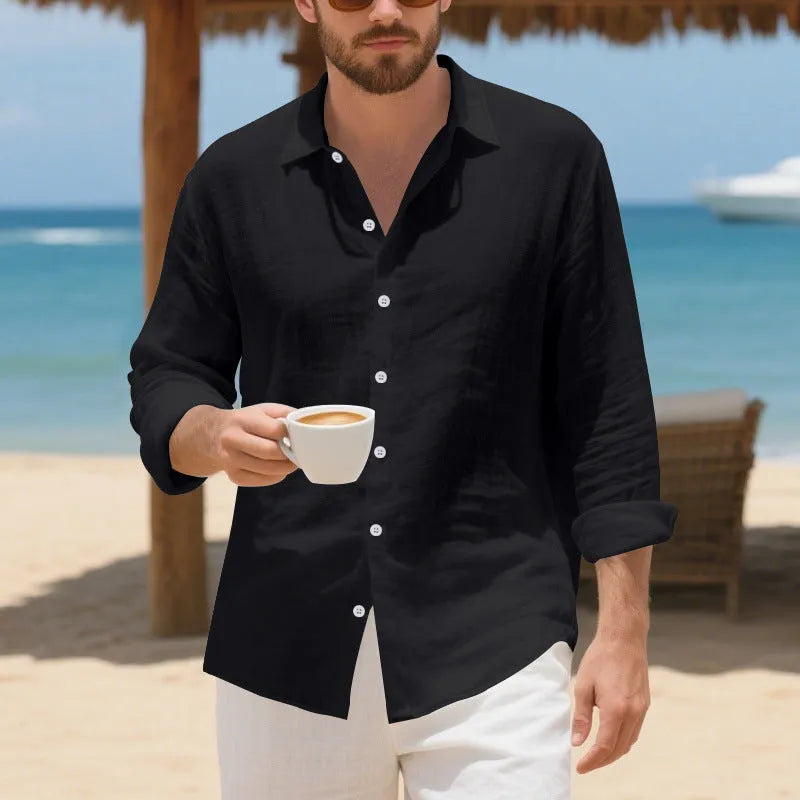 A man's loose-fit linen Hawaiian casual shirt in an earthy colour on a hanger.