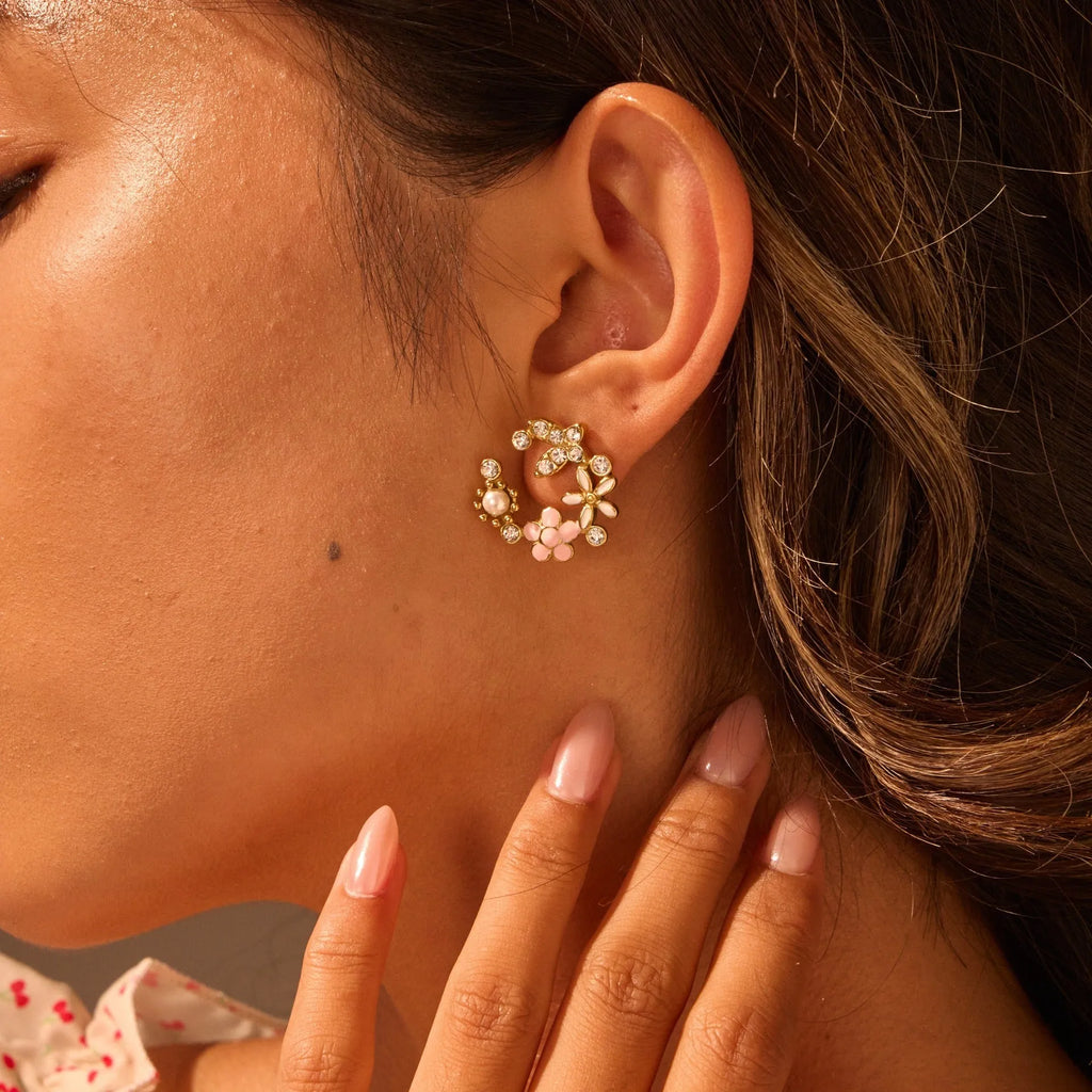 Colourful oil diamond flower stud earrings with gold plating on stainless steel.