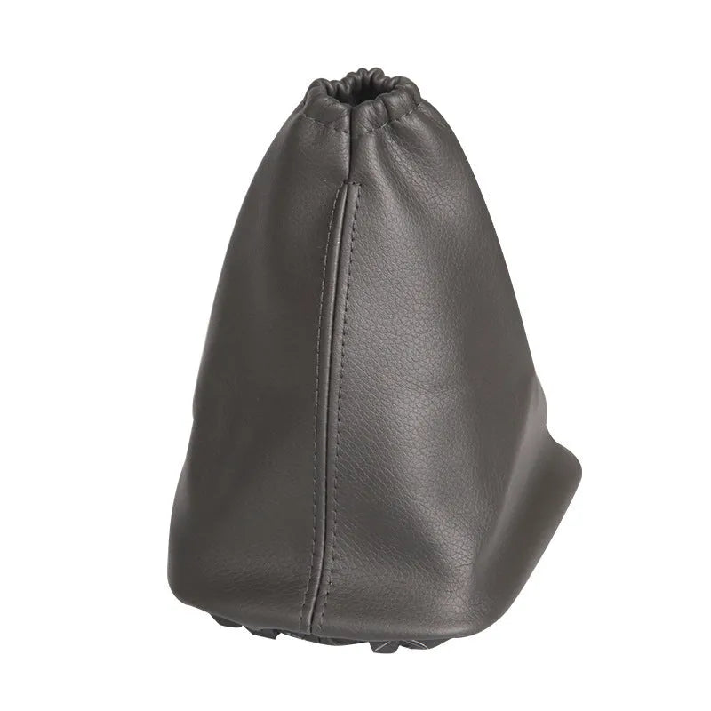 Black leather shift lever cover for Toyota Corolla cars measuring 15.2 by 12.9 cm