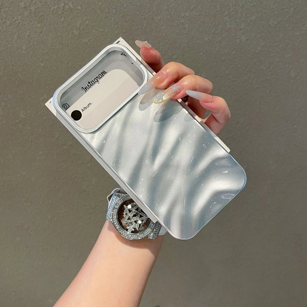 Soft solid colour wave pleated TPU protective case for Apple iPhone 17 series in burgundy on a white background.