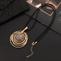 Gold geometric pendant sweater chain necklace with snakeskin texture rope on model