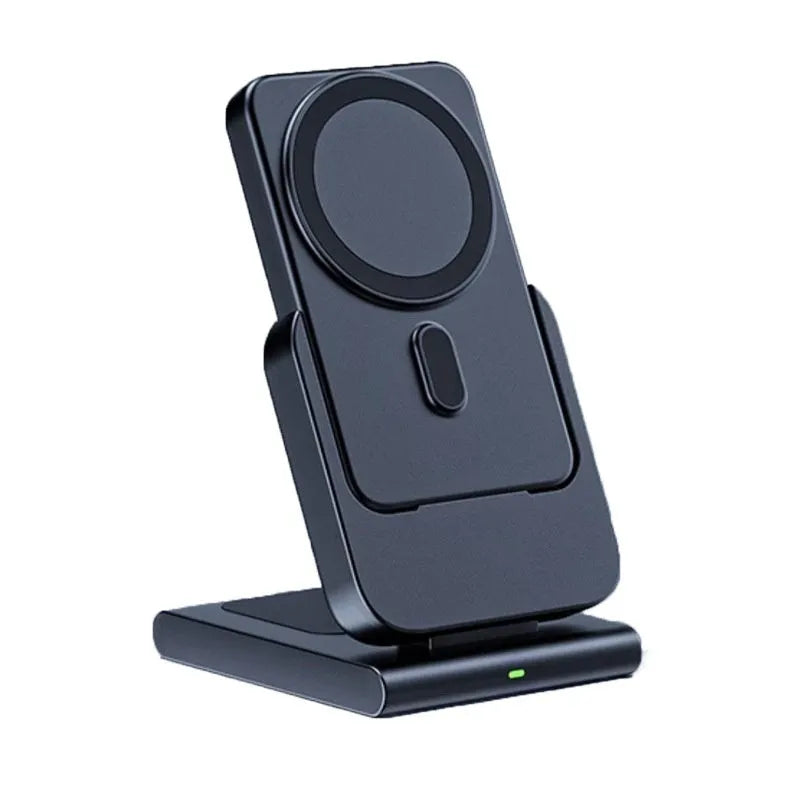 Black three-in-one magnetic power bank with folding stand charging iPhone 12, Apple Watch, and AirPods Pro wirelessly on a desk