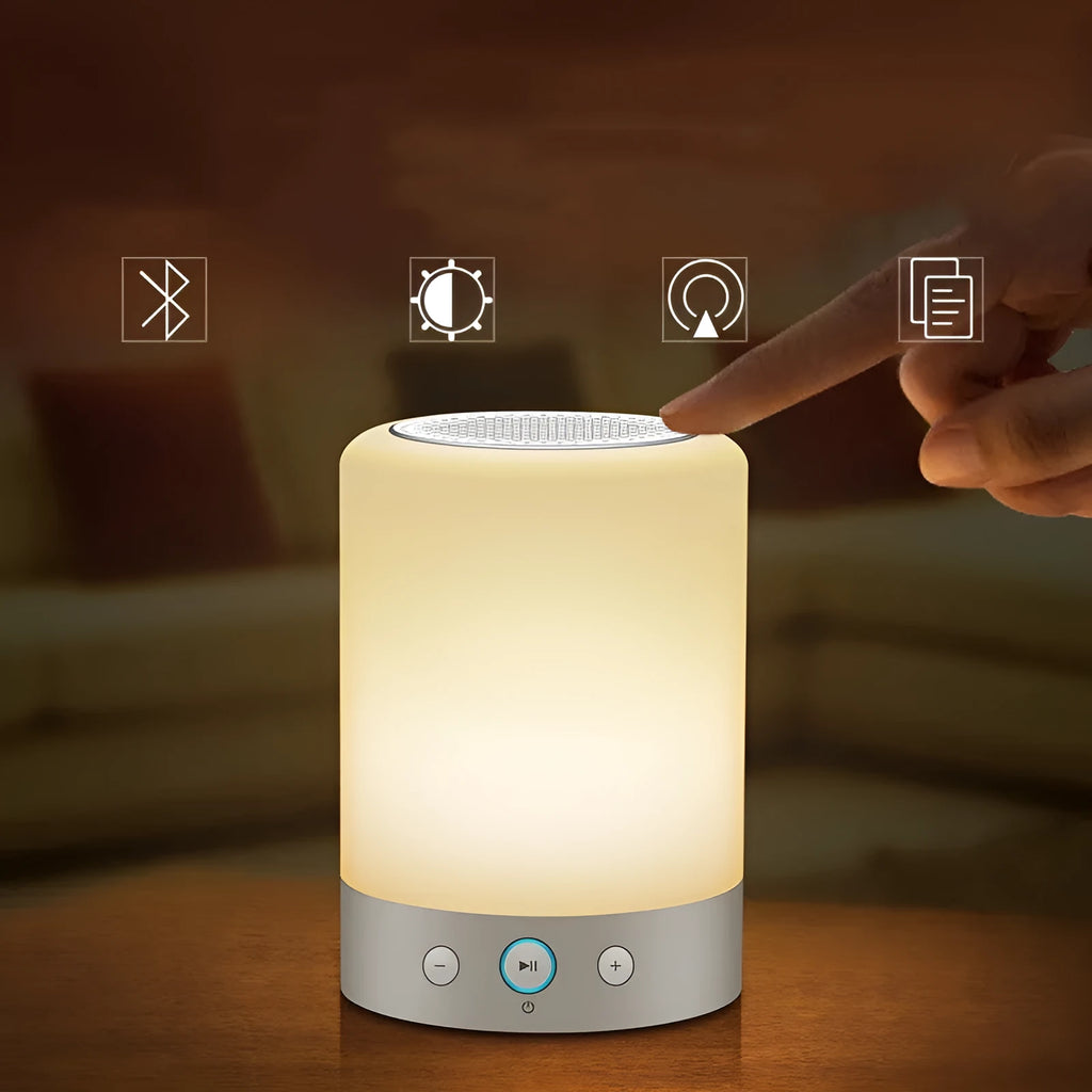 White mini portable Bluetooth sound light speaker with 5W output and touch controls on a surface