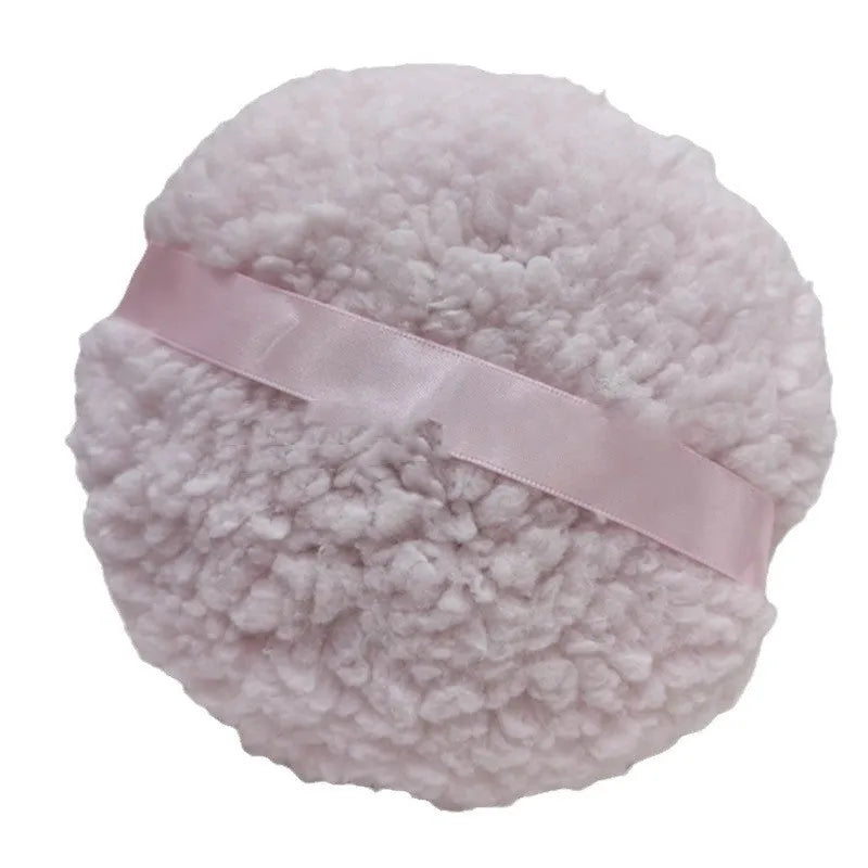 Oversized rectangular plush powder puff in pink, white, or skin colour on white background.