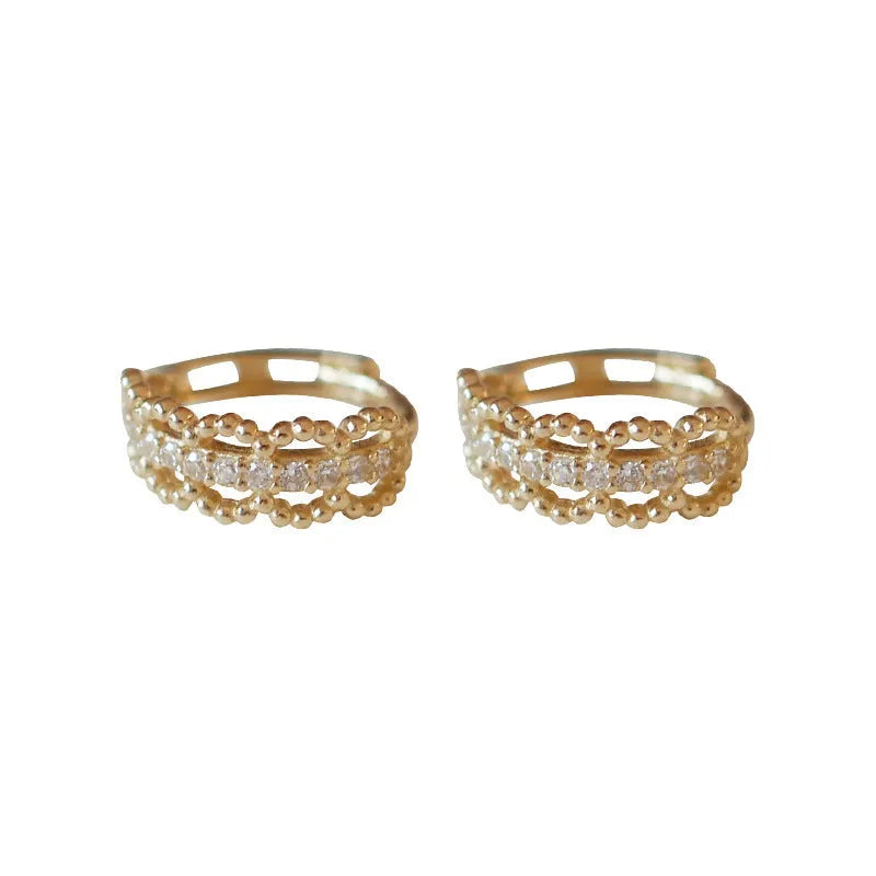 Small gold lace bone stud earrings with clip backing, made from 925 silver.