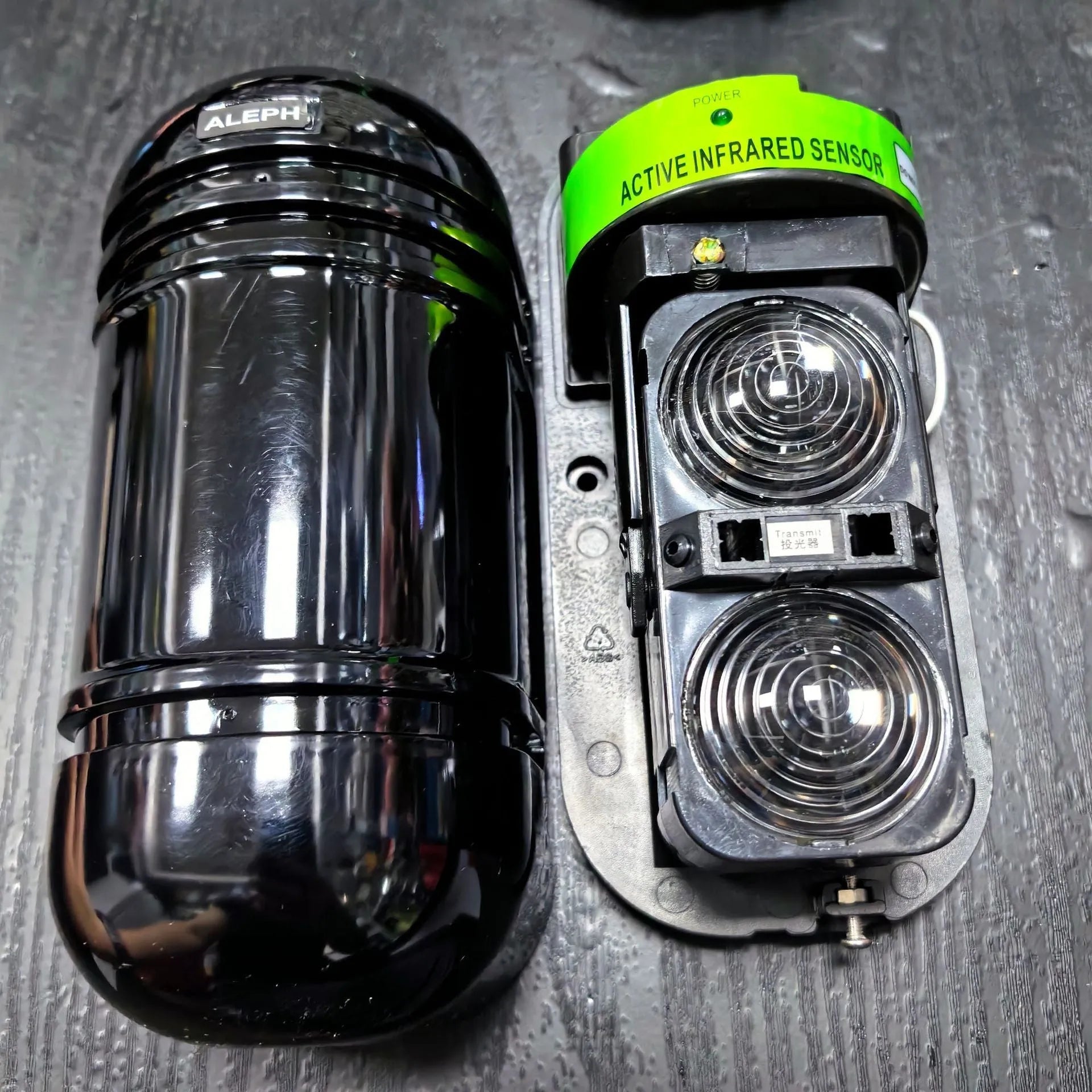 Black infrared security detector with wired connections for perimeter alarm systems
