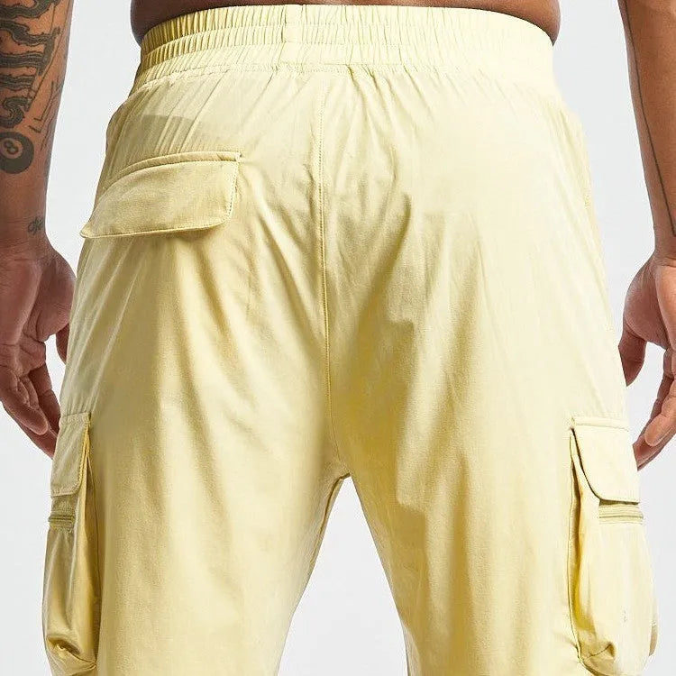 Men's black sports shorts with four-sided elastic fabric and quick-dry lining for running and gym workouts