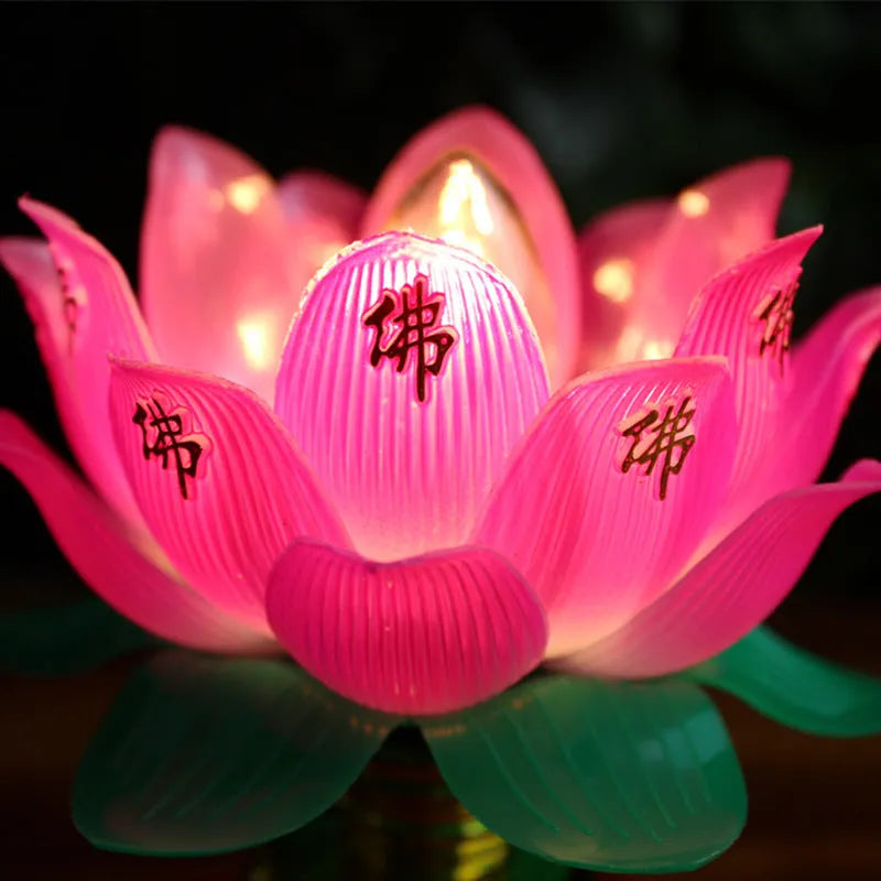 Buddha worshiping plug-in lamp featuring a colourful lotus light.