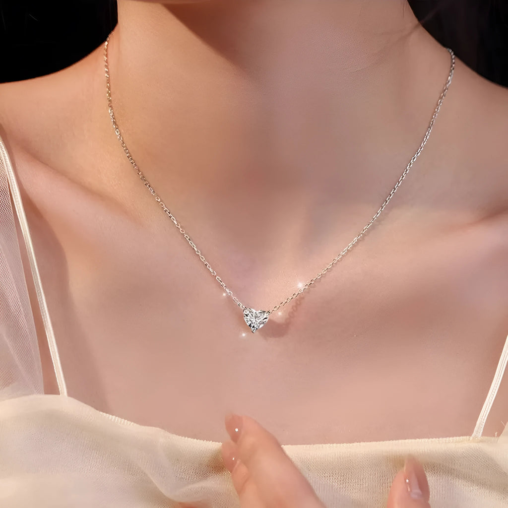 Women's silver love necklace with heart pendant on copper chain