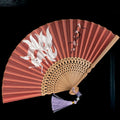 Traditional bamboo folding fan with embroidered butterfly and nine-tailed fox designs