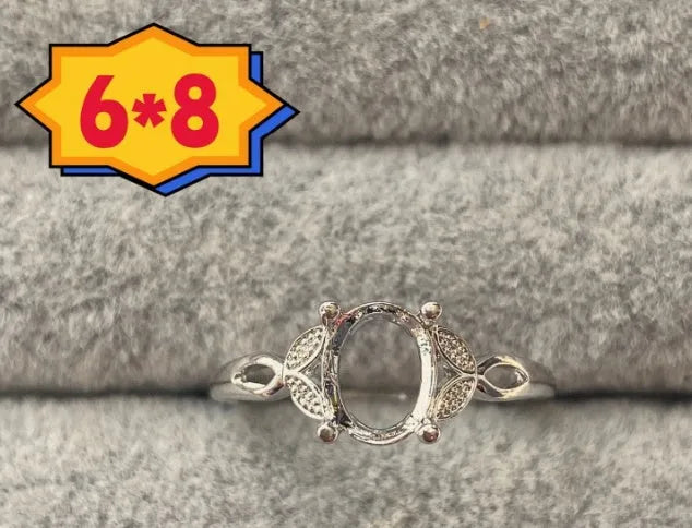 Oval denier copper ring with 6x8mm stone, star detail, and open-mouth band in Korean style.