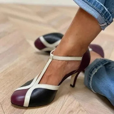 Women's round-toe high heel shoes with a button strap, shown in blue light pink colour.