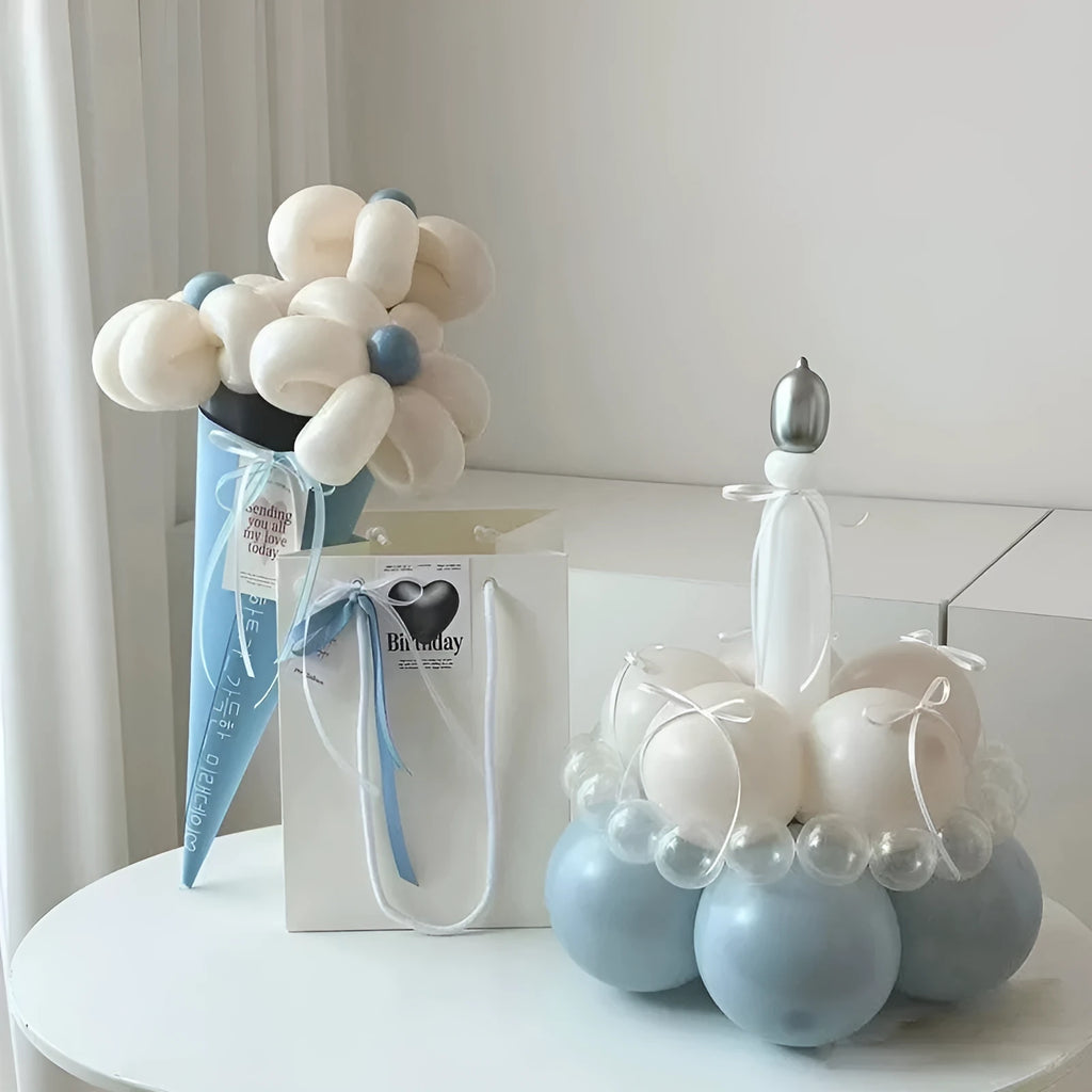 DIY balloon bouquet cake decoration kit with assorted balloons for creating a round cake topper.