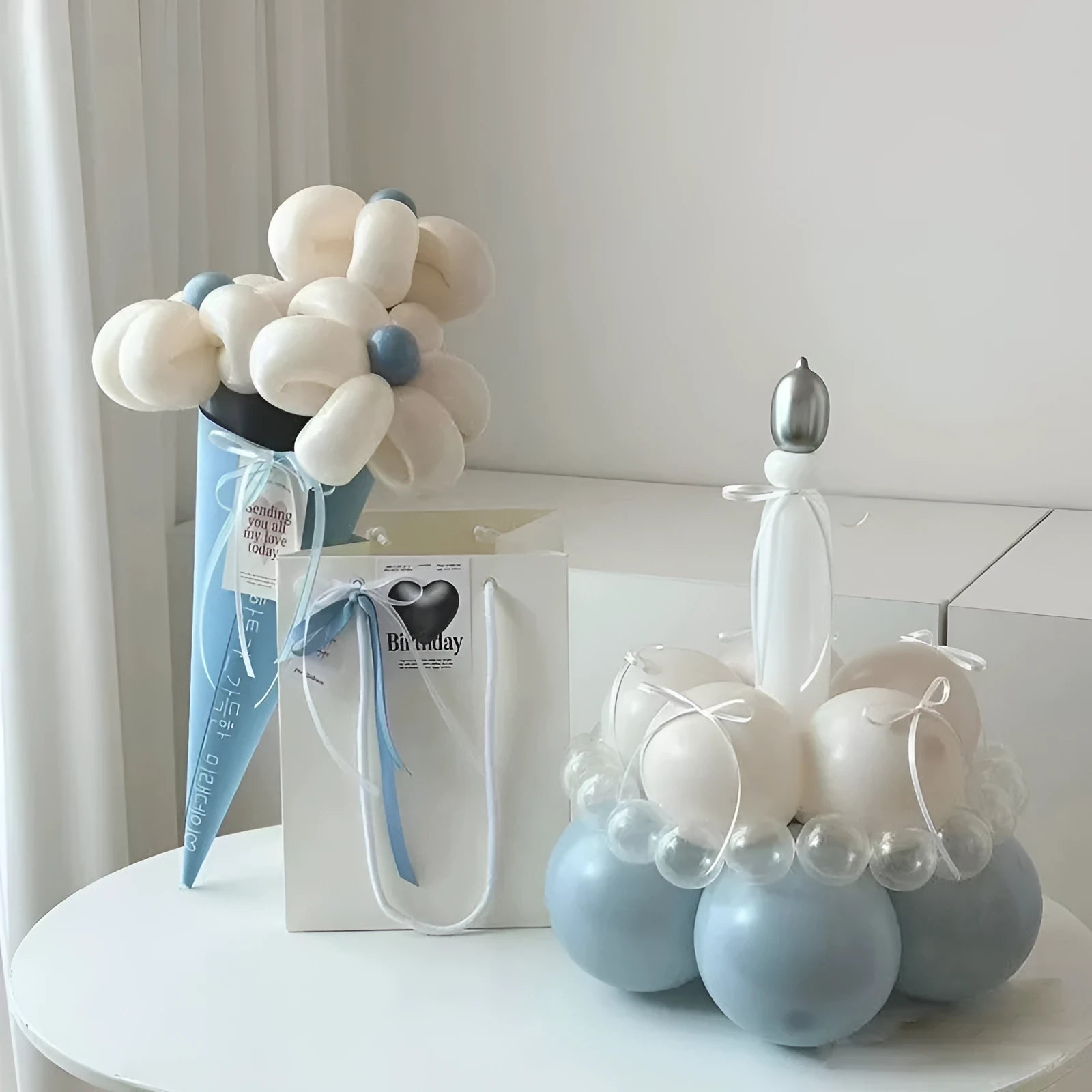 DIY balloon bouquet cake decoration kit with assorted balloons for creating a round cake topper.