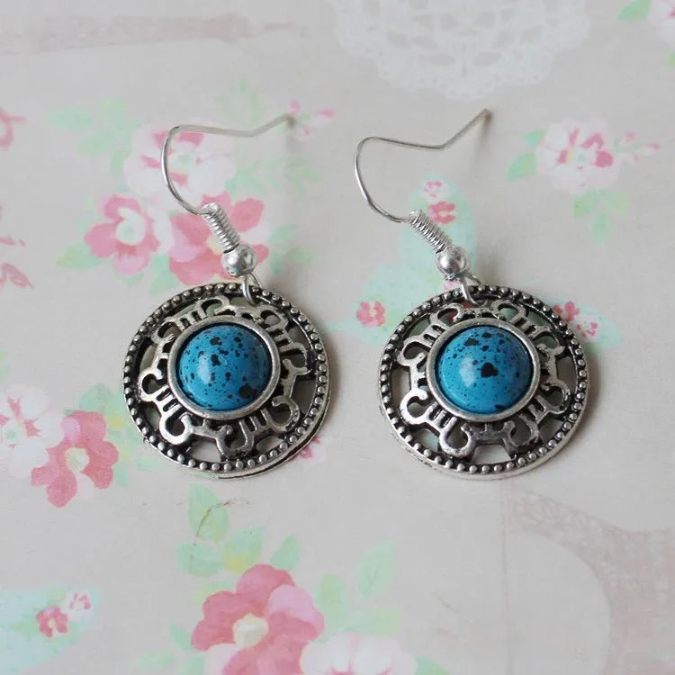 Miao silver retro turquoise flower disk earrings with geometric design in red, blue, and black colours