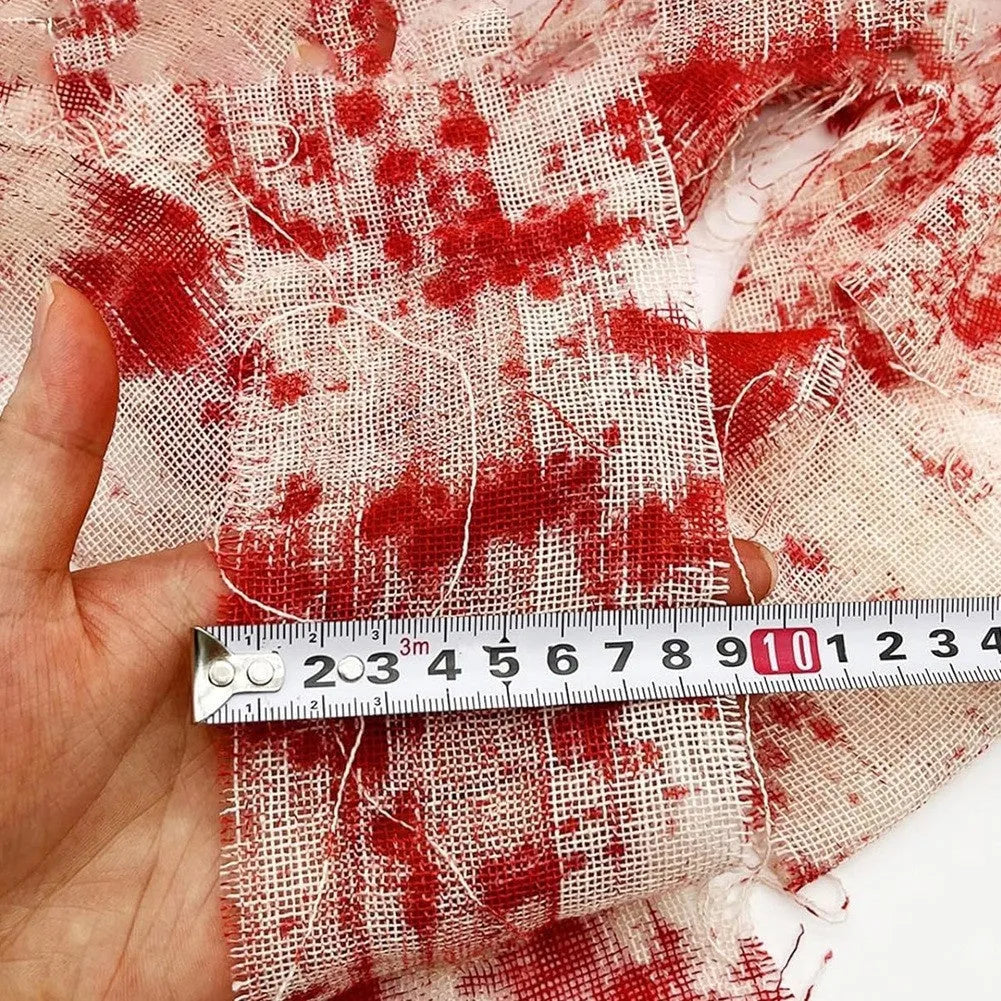 Halloween horror bandage roll showing 8cm wide polyester gauze with bloody red dyed finish