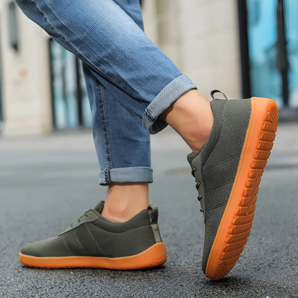 Men's wide fit walking shoes with Flyknit upper in black, green, camel, or white with rubber sole