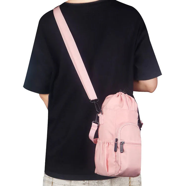 Canvas water bottle shoulder pouch with crossbody strap in black, green, and pink colour options