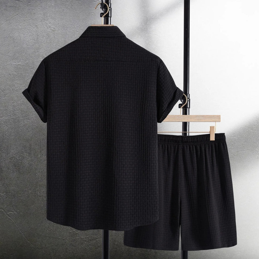 Men's white cotton blend beach shirt and shorts suit set laid flat showing cardigan style and short sleeves