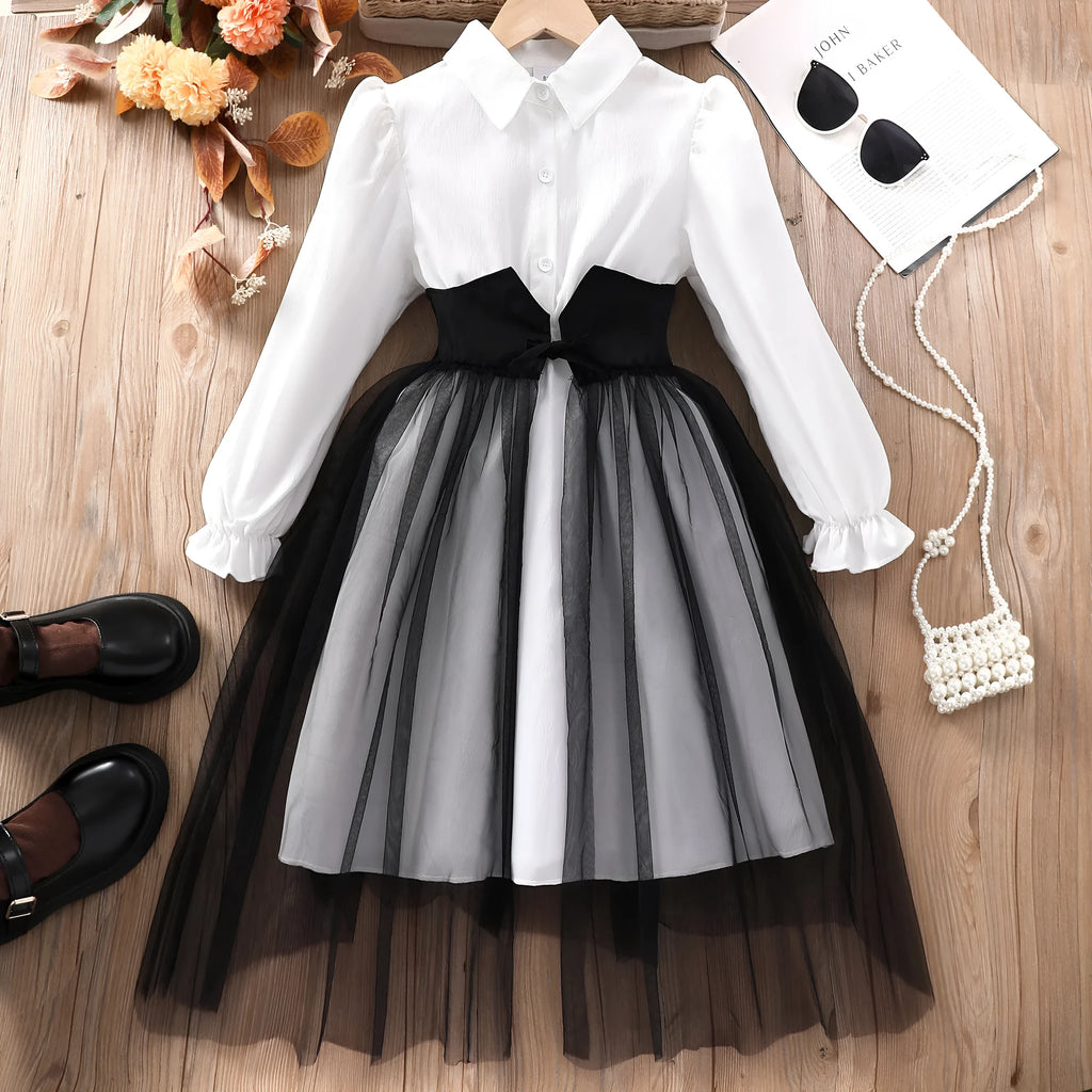 Solid colour girls dress with mesh stitching detail in black