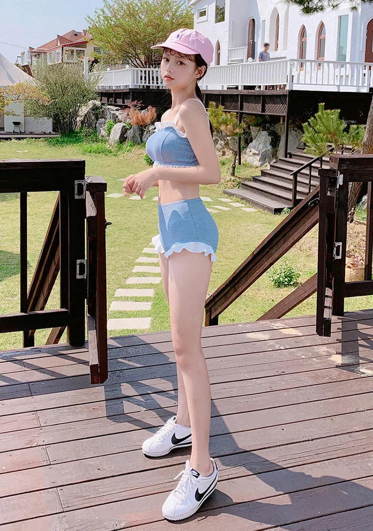 Solid colour women's one-piece swimsuit with suspender straps