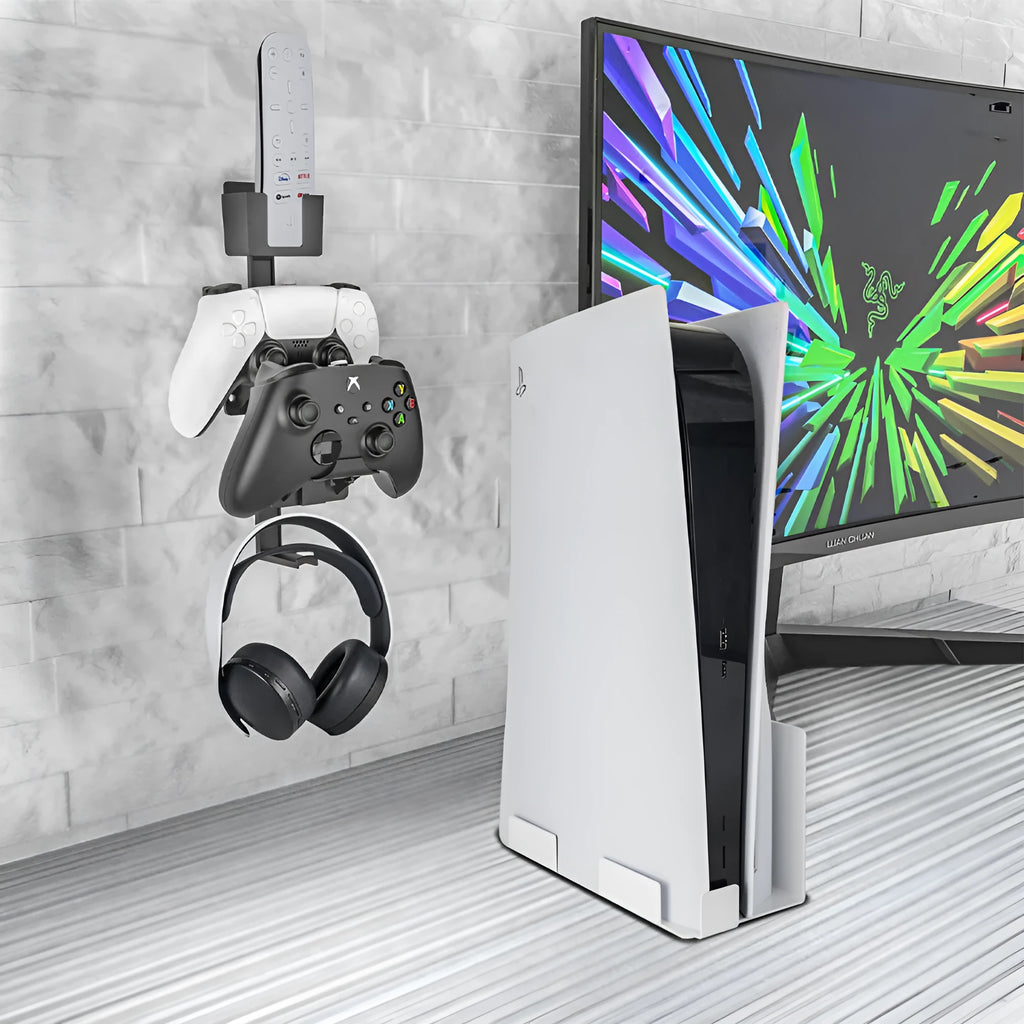 White wall-mounted plastic hook holding a game controller and a gaming headset.