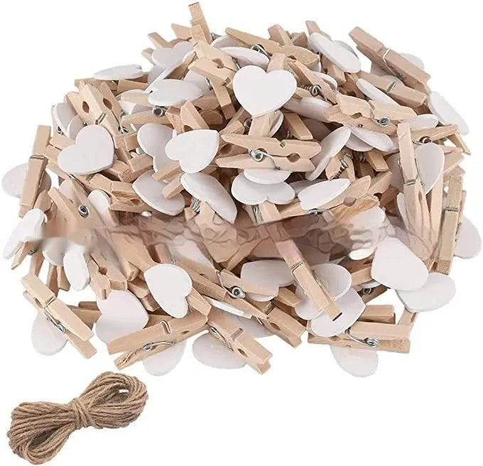 Set of five wooden heart-shaped clips in red, white, pink, yellow, and rose red colours.
