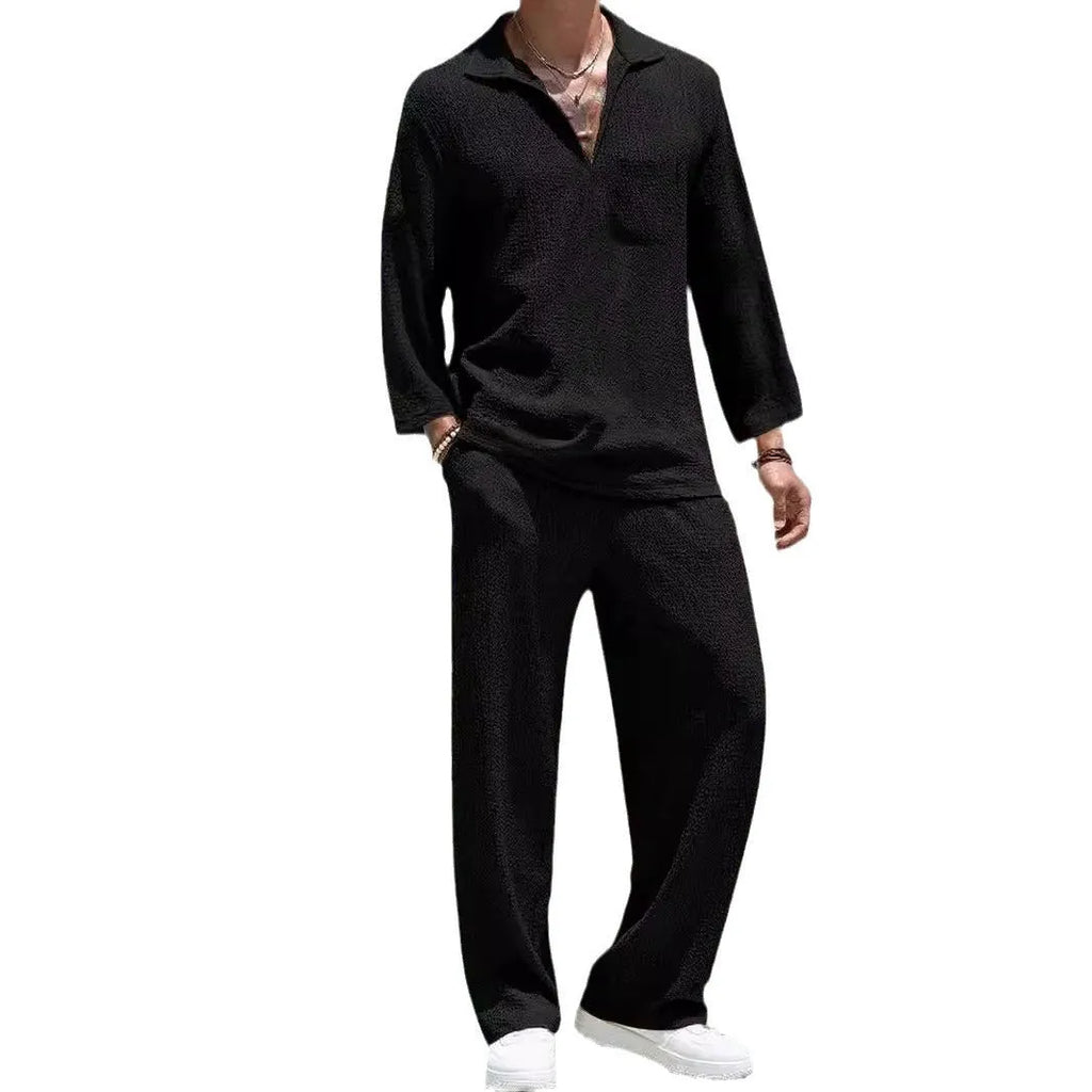 Man wearing a lake blue casual shirt and trouser suit set for commuting.