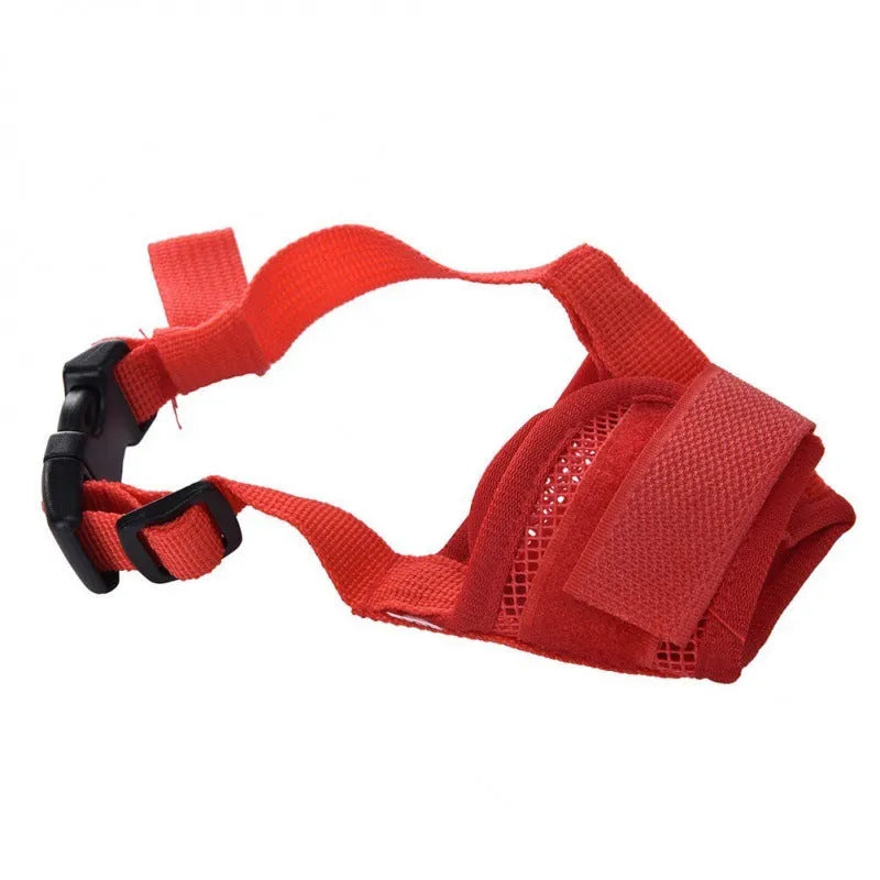 A black plastic basket-style dog muzzle shown on a size chart with measurements for S, M, L, XL, and XXL sizes.