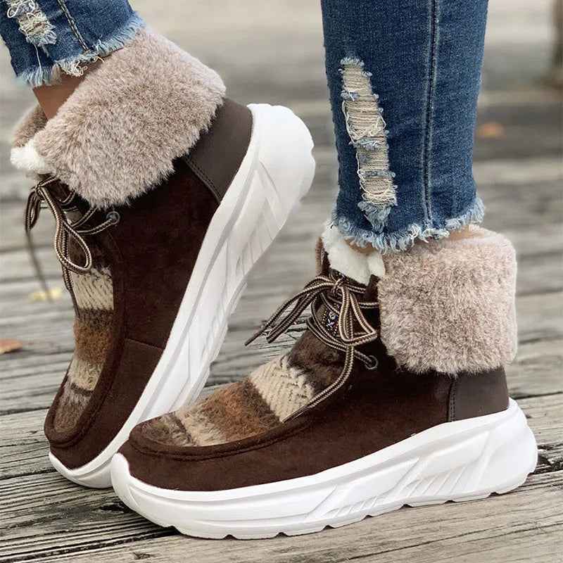 Women's beige suede snow boots with lace-up front and thick rubber sole