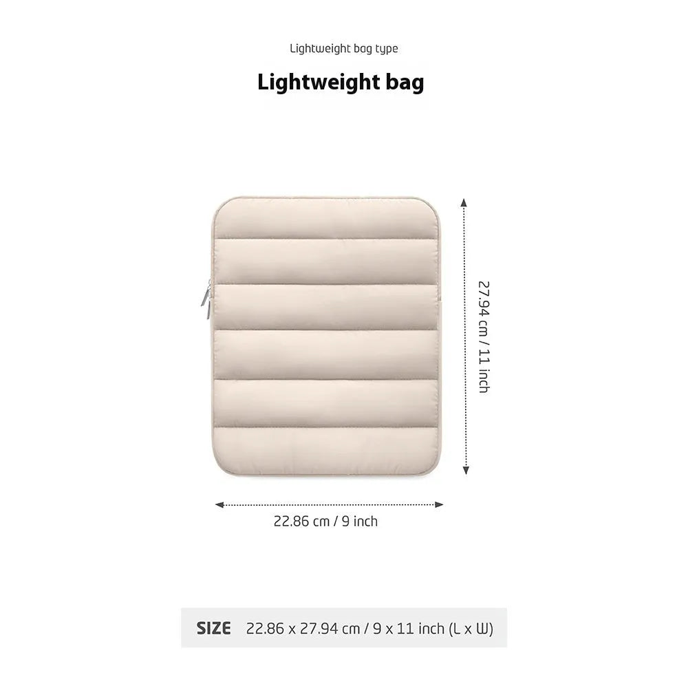 Black fluffy padded laptop sleeve for 9.7 to 11-inch devices with elastic sides.