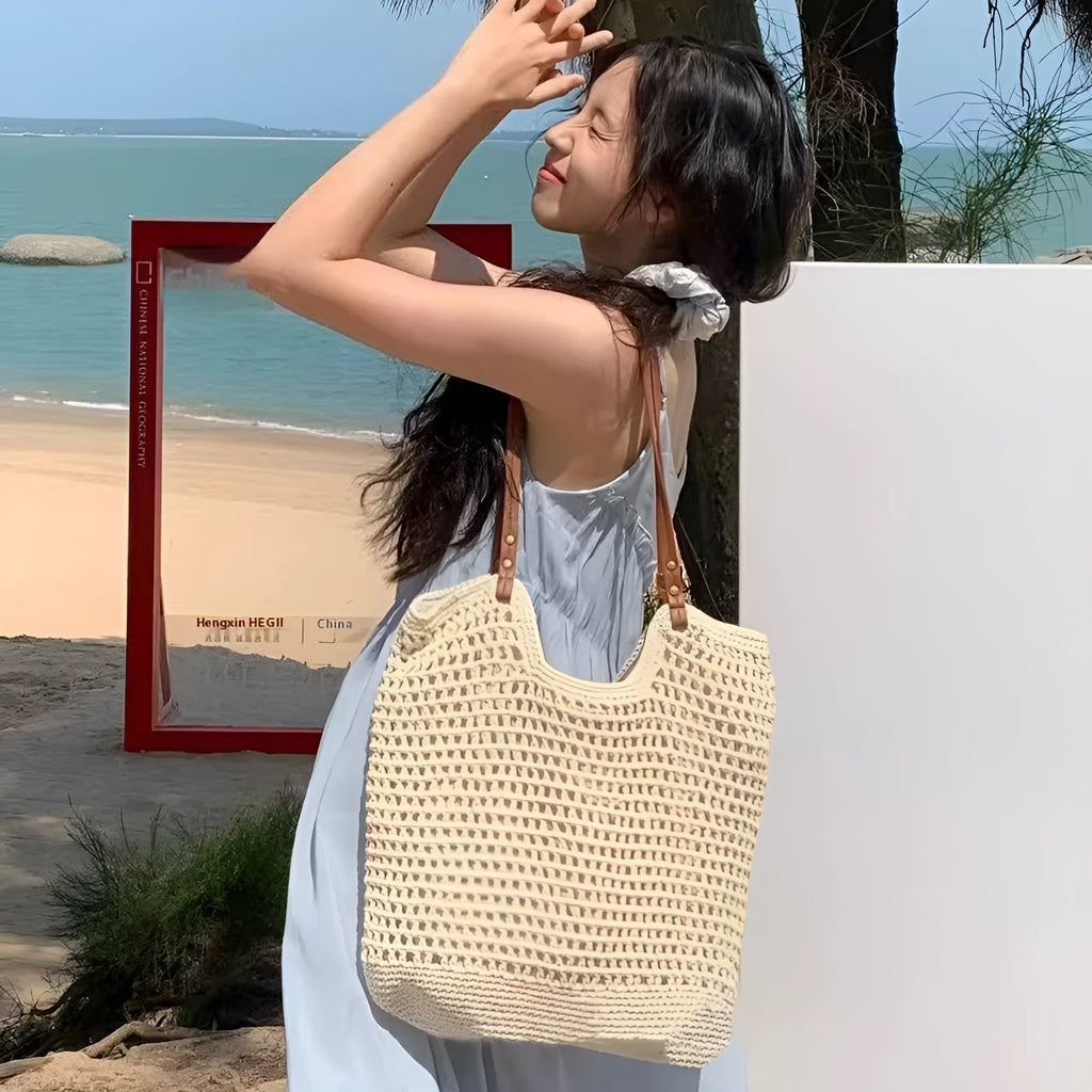 Beige woven cotton and linen large capacity shoulder bag with a choice of magnetic snap or zipper closure.