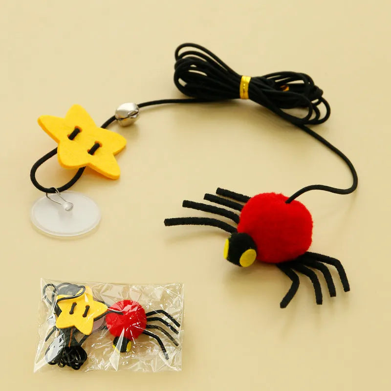 Red and yellow cat hanging door toy with elastic rope, feather stick, bell, and spider attachment.