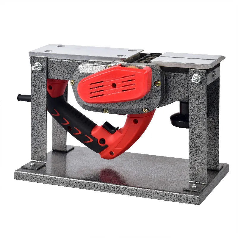 Red desktop electric wood planer with aluminium body, showing 82mm planing width