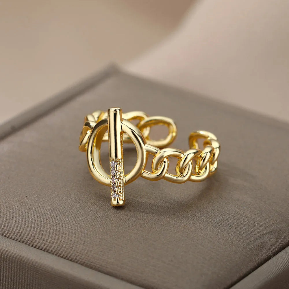 Gold plated copper adjustable open ring with zirconia inlay and OT buckle design