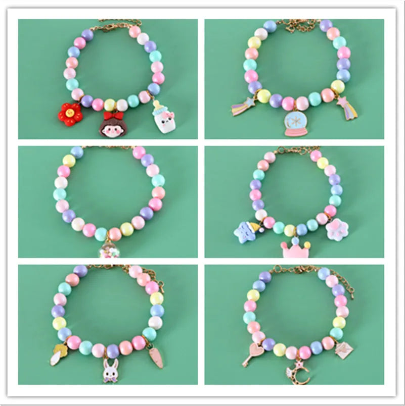 Colourful resin necklace collar and bracelet set for a dog, showing macaron-themed rabbit and moon charms.